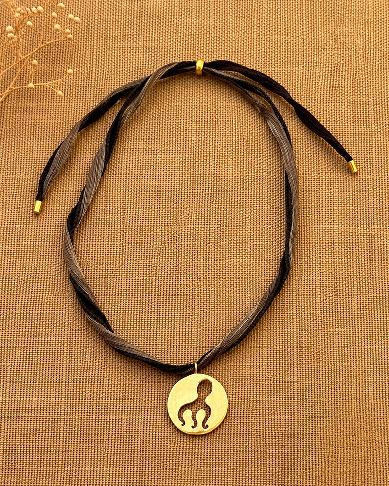 Collier poulpe 3 pattes - cordon de soie noir